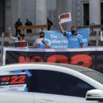Alameda Post - App-based gig workers hold demonstration outside Los Angeles City Hall to urge voters to vote no on Proposition 22 in California