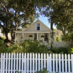 Alameda Post - a yellow cottage at 1620 Fourth Street with a white picket fence