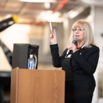 Alameda Post - Madlen Saddik of the Alameda Chamber and Economic Alliance speaks aboard the USS Hornet, April 8, 2022