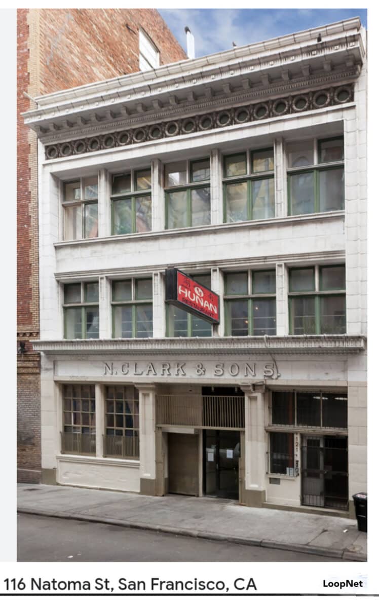Alameda Post - an old building in San Francisco with a small hanging restaurant sign. The front of the building also says N. Clark & Sons in sturdy lettering