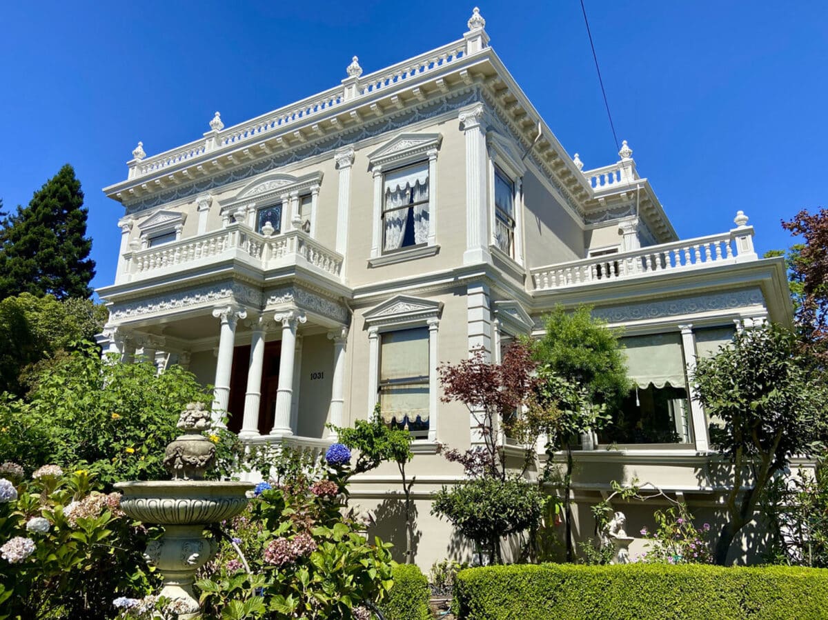 Alameda Post - a large intricately decorated white house