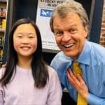 Alameda Post - Will Green smiles with a student