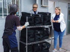 Alameda Post _ Meals on Wheels volunteers move lots of food.