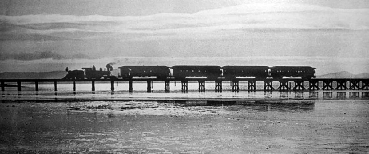 Alameda Post - South Coast Pacific Railroad locomotive crosses San Leandro Bay