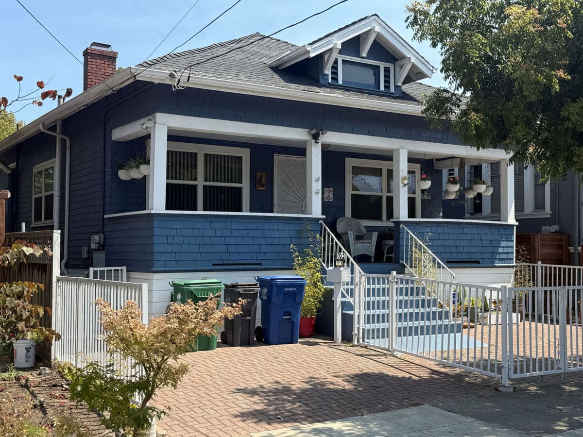 Alameda post - a one story blue bungalow home