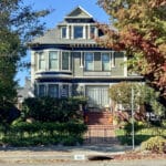 Alameda Post - 921 Grand Street, a handsome three story home with a brick walkway and stairs