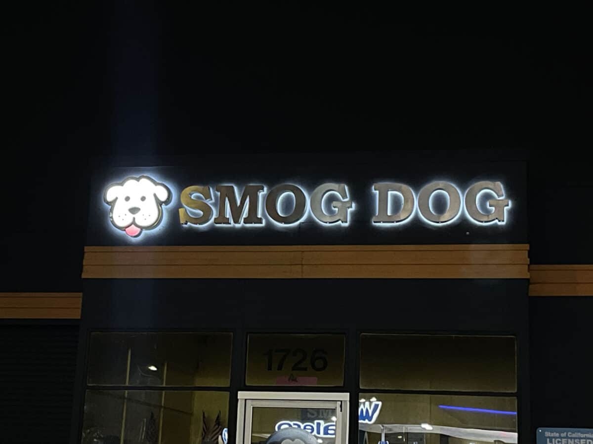 Alameda Post - The sign at Smog Dog, which includes a cartoon dog face.