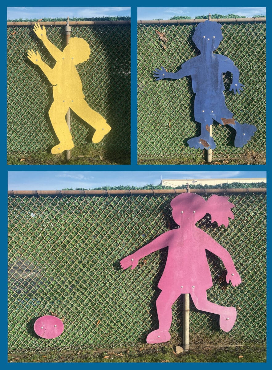 Alameda Post - Decorations of cutout figures of children playing. The cutouts are brightly colored. 