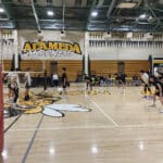 Alameda Post - Alameda High School boys volleyball team plays on the court