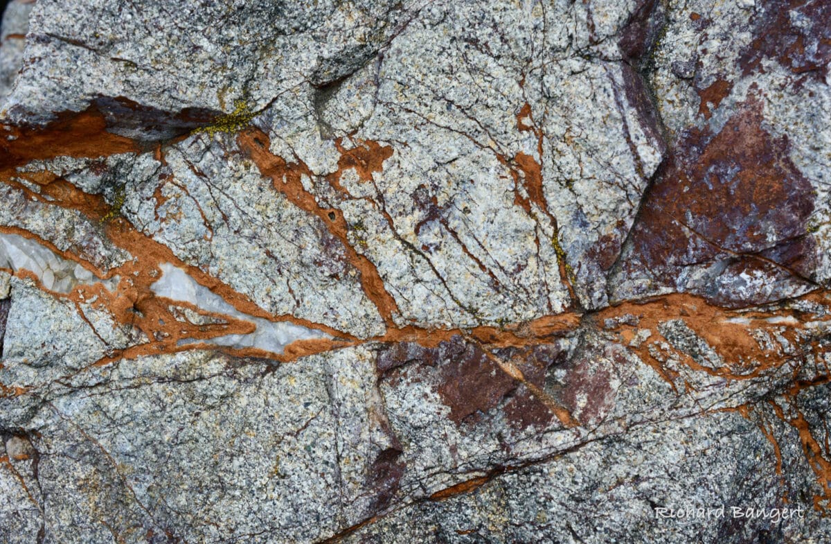 Alameda Post - granite with a strip of red-ish orange rock