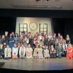 Alameda Post - a group photo of the cast and crew for Radium Girls. They are all posing together onstage
