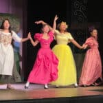 Alameda Post - characters in Cinderella perform onstage in colorful ballgowns