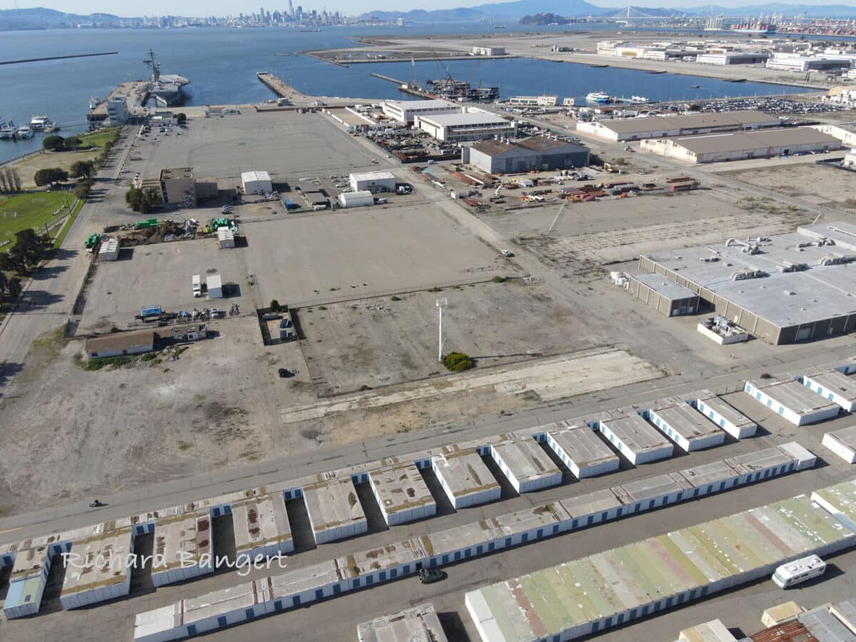 Alameda Post - An aerial view of parking lots and buildings at Alameda Point.