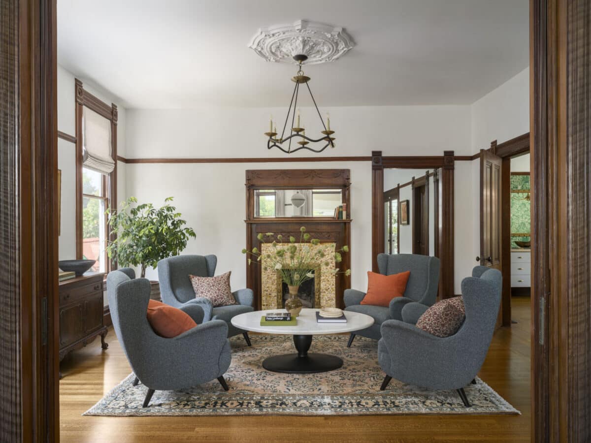 Alameda Post - a sitting room with four large chairs facing towards each other