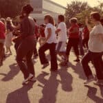 Alameda Post - A group of people dancing to stay healthy
