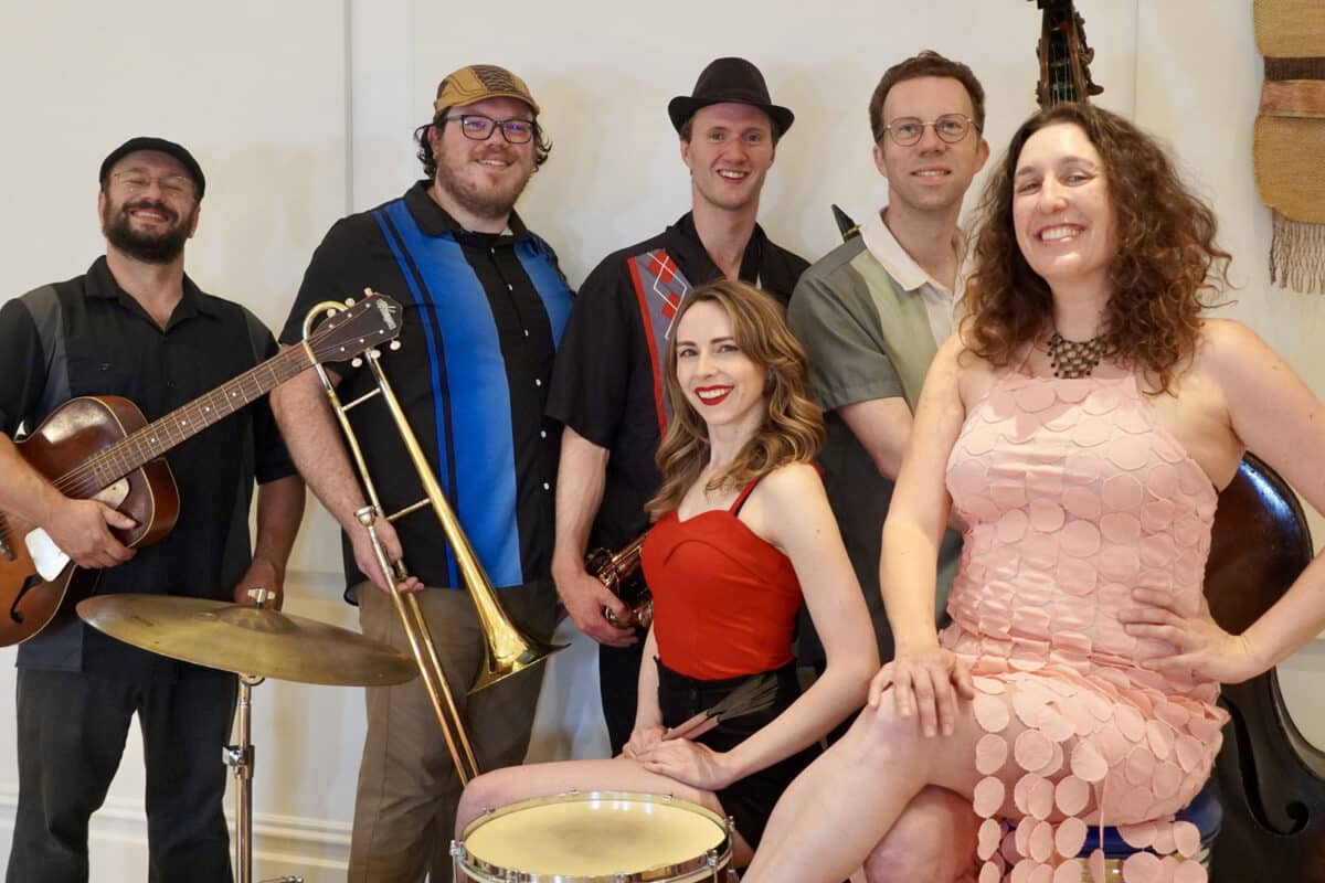 Alameda Post - A group photo of the six members of the Death and Taxes Swing Band.