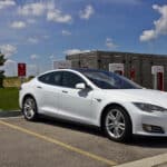 Alameda Post - a tesla plugged into a charging station
