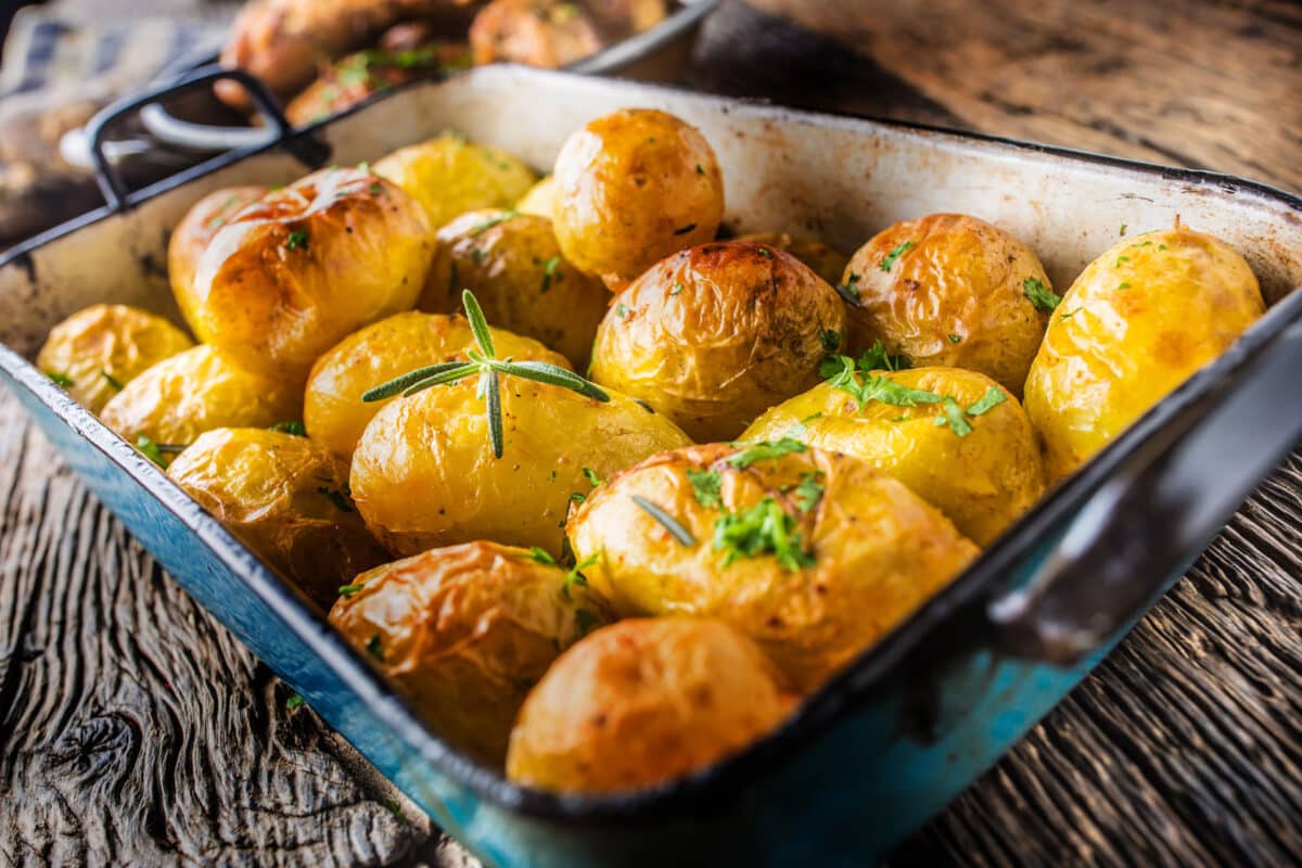 Alameda Post - a casserole dish of baked potatoes. 