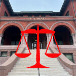 Alameda Post - a photo of City Hall with an image of the scales of justice on top