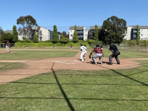 Alameda Post - An Encinal Jet player runs towards first base