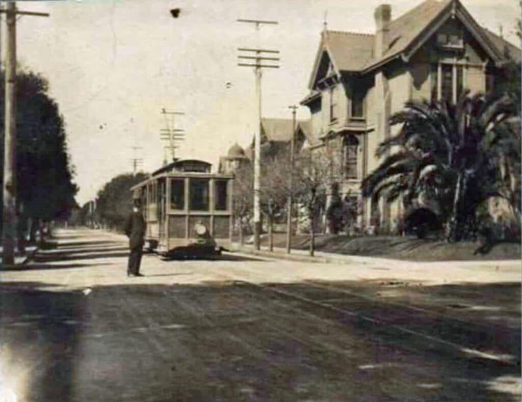 Alameda Post - a black and white photo of a streetcar on Grand Street