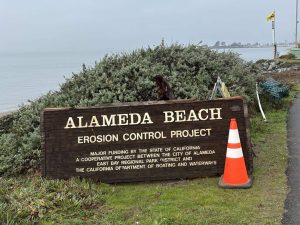 Alameda Post - a sign with a construction cone in front of it that says "Alameda Beach Erosion Control Project"