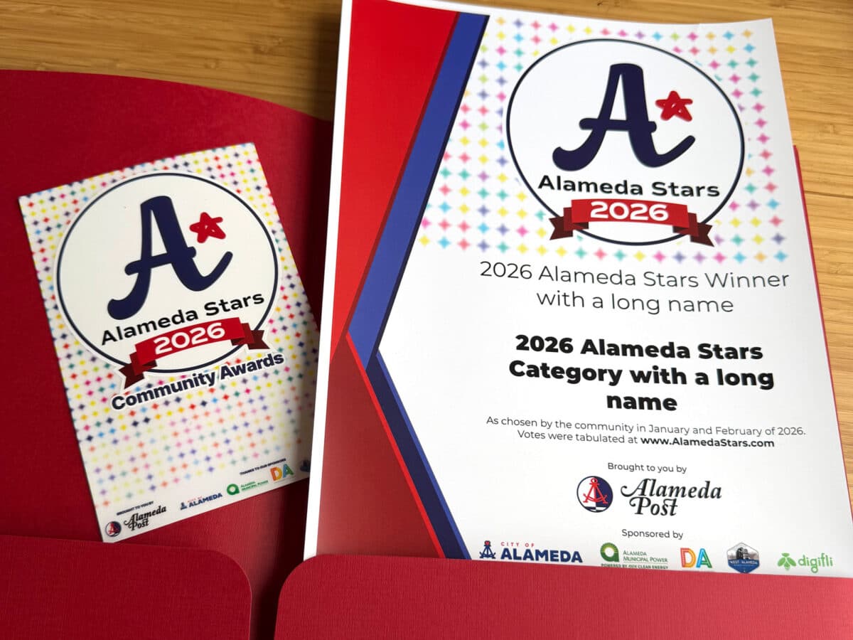 Alameda Post - A red folder full of official Alameda Stars award and sticker.