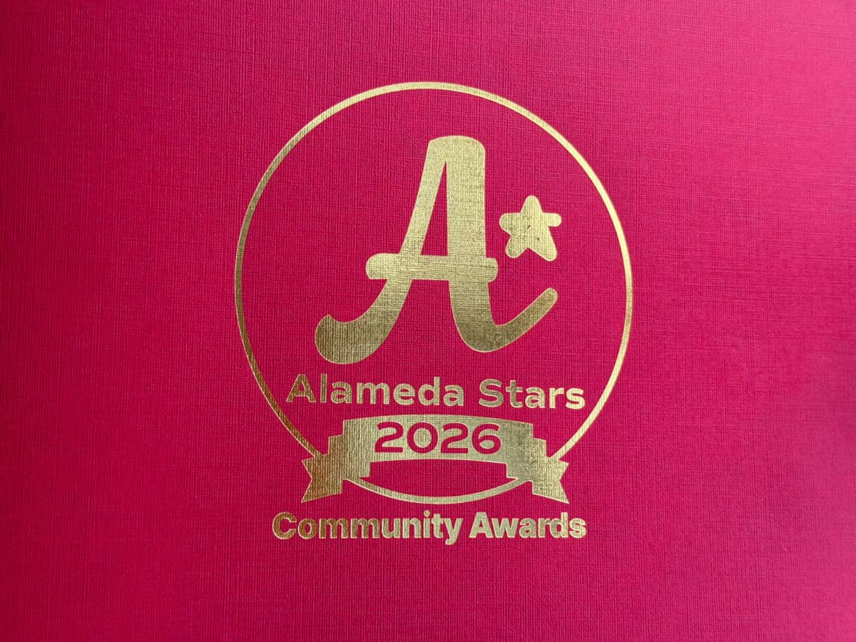 Alameda Post - A golden embossed red piece of paper with the logo for Alameda Stars 2026.