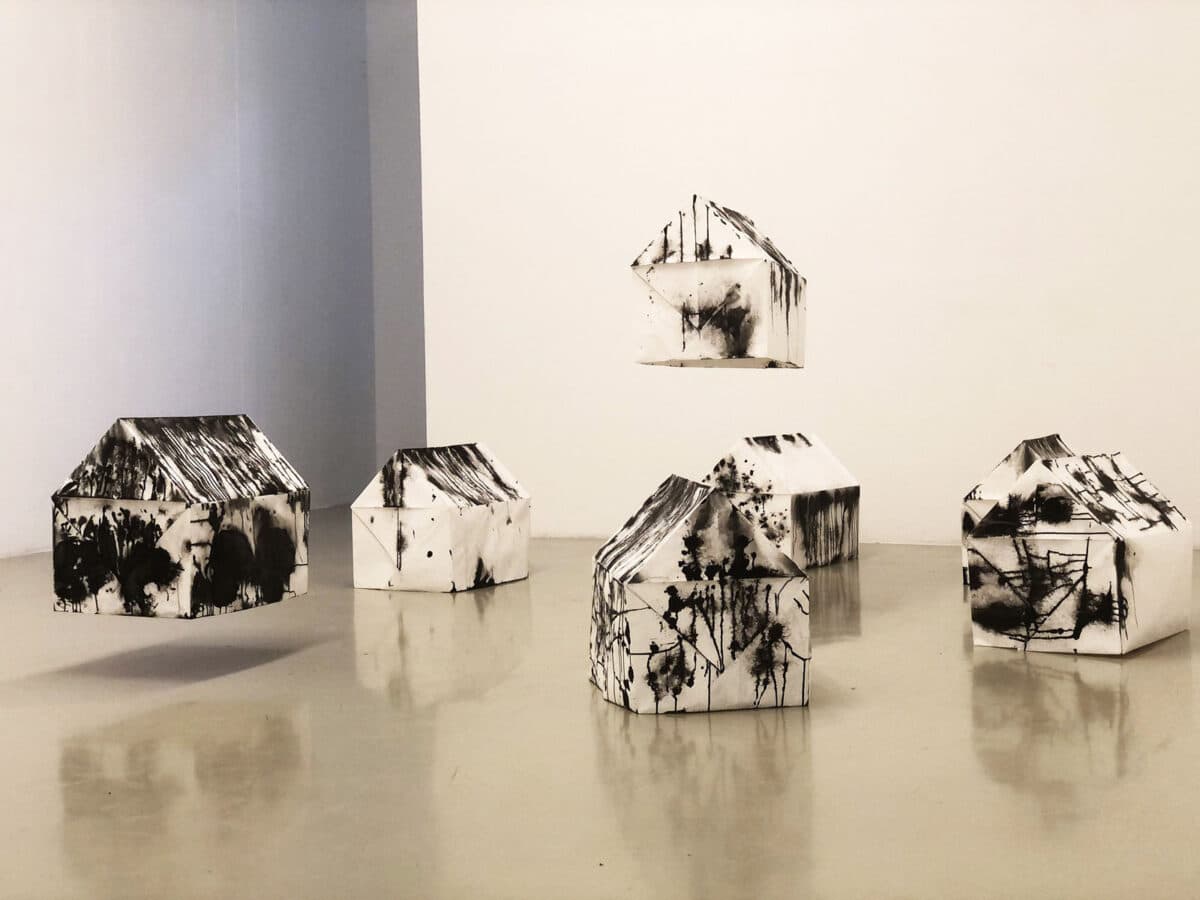 Alameda Post - An art exhibit of black and white houses.