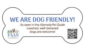 Alameda Post - a bone shaped decal with the words, "We are dog friendly! As seen in the Alameda Pet Guide, Leashed, well-behaved dogs are welcome!"