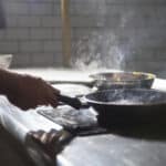 Alameda Post - someone cooks on an electric stove