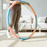 Alameda Post - a weighted hula hoop next to someone holding it