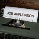Alameda Post - a typewriter with a paper sticking out that says "Job Application". Continue for City of Alameda vacancies