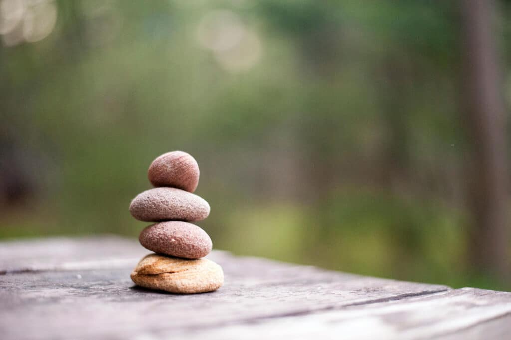 Alameda Post - stacked stones on a table