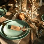 Alameda Post - a place setting with "Thank You" written on a note