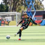 Alameda Post - an Oakland Roots player kicks the ball in the game against Sacramento Republic