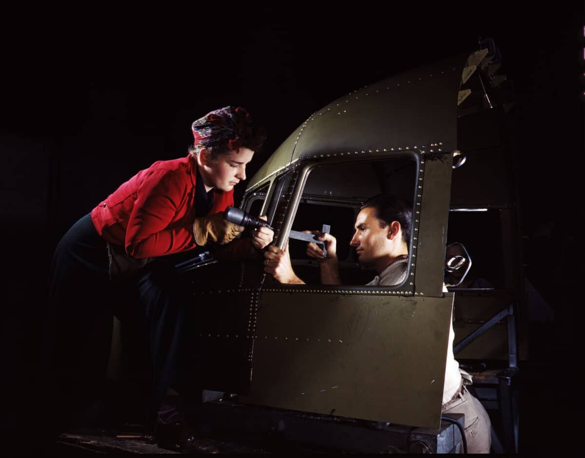 Alameda Post - A man and woman work together building an aircraft. 