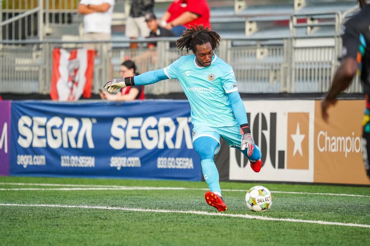 Alameda Post - A soccer player dressed in blue about to kick a soccer ball