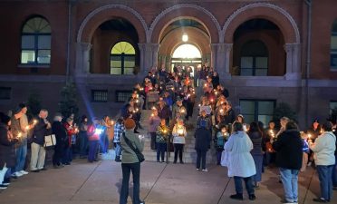 Alameda Post - A candlelit vigil on the steps of City Hall.