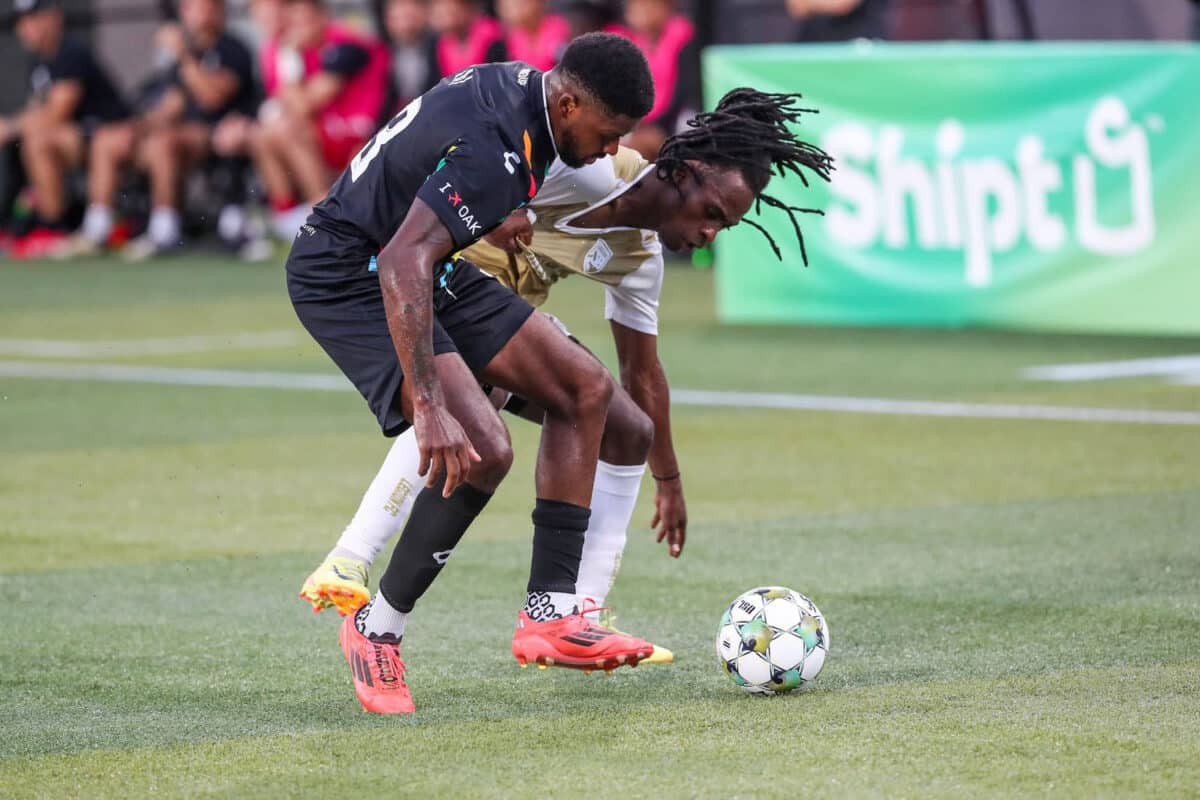 Alameda Post - an Oakland Roots player goes for the ball against a Birmingham Legion FC player