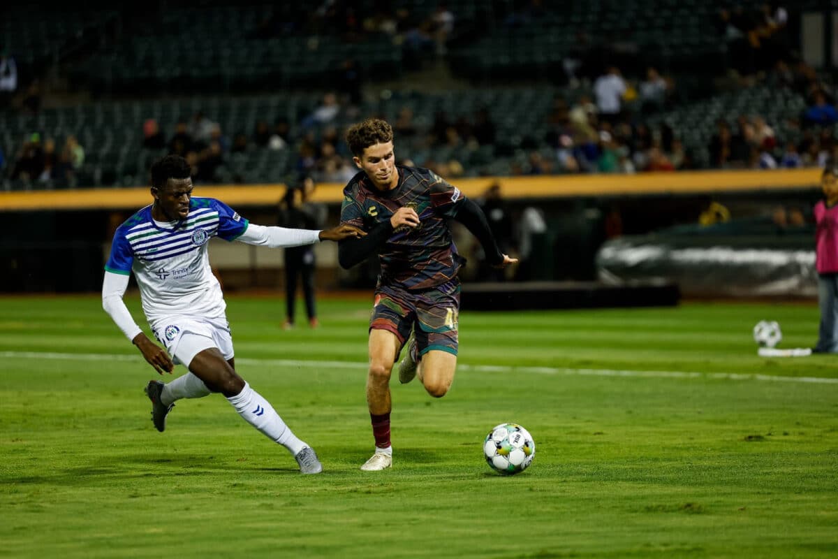 Alameda Post - An Oakland Roots player goes for the ball in a match against Hartford Athletic.