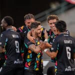 Alameda Post - Oakland Roots players congratulate each other in the match versus Detroit City FC