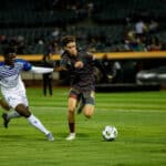 Alameda Post - An Oakland Roots player goes for the ball in a match against Hartford Athletic.