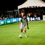 Alameda Post - an Oakland Roots player dribbles the ball in a match against Sacramento Republic FC