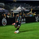 Alameda Post - an Oakland Roots player kicks the ball in a match against FC Tulsa