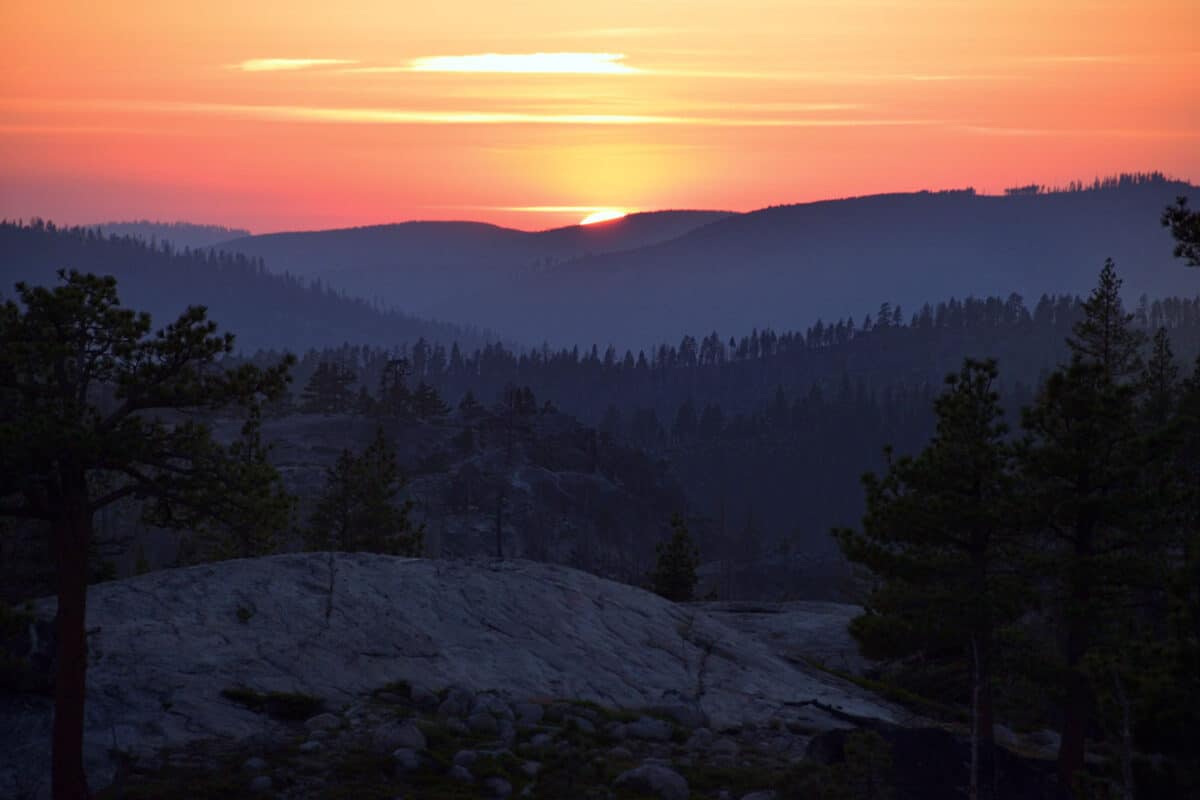 Alameda Post - a sunset seen behind a mountain