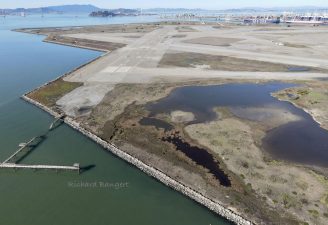 Alameda Post - An aerial view of an Alameda Point runway and shoreline.